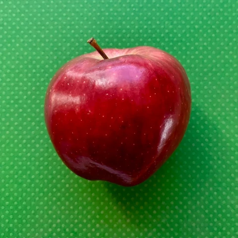 Red Apple Green Background